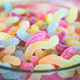 Bowl of sour gummy worms candy